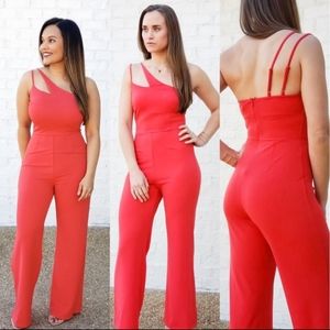 Red jumpsuit, one shoulder detail